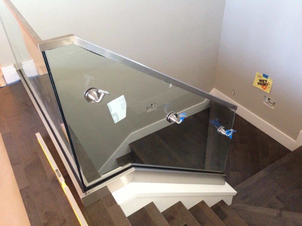 Glass Stairwell Handrail with Fittings for Through Glass Attachment